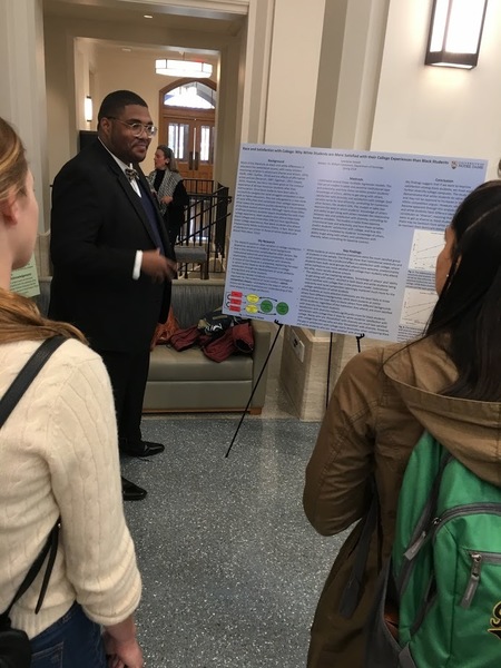 Student Presenting At The Senior Thesis Poster Session